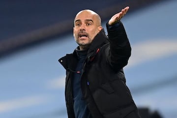 Manchester City's Spanish manager Pep Guardiola gestures on the touchline during the English Premier League football match between Manchester City and Burnley at the Etihad Stadium in Manchester, north west England, on November 28, 2020
