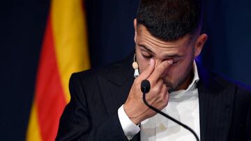 Barcelona's Spanish defender Jordi Alba gets emotional as he delivers a speech during a farewell event at the Camp Nou stadium in Barcelona on June 1, 2023. Alba departs Barcelona FC with six La Liga trophies and one Champions League triumph among other silverware. (Photo by Josep LAGO / AFP)