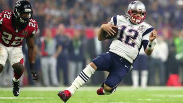 HOUSTON, TX - FEBRUARY 05: Tom Brady #12 of the New England Patriots runs for a first down against the Atlanta Falcons in the third quarter during Super Bowl 51 at NRG Stadium on February 5, 2017 in Houston, Texas. Tom Pennington/Getty Images/AFP
== FOR NEWSPAPERS, INTERNET, TELCOS & TELEVISION USE ONLY ==