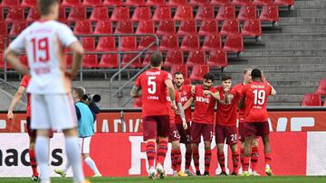 COLOGNE, GERMANY - APRIL 20: Jonas Hector of 1.FC Koeln  celebrates with teammates after scoring their team&#039;s first goal  during the Bundesliga match between 1. FC Koeln and RB Leipzig at RheinEnergieStadion on April 20, 2021 in Cologne, Germany. Spo