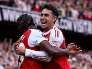 Arsenal's Spanish defender #36 Martin Zubimendi (R) celebrates scoring the team's first goal with Arsenal's English defender #20 Noni Madueke during the English Premier League football match between Arsenal and Nottingham Forest at the Emirates Stadium in London on September 13, 2025. (Photo by HENRY NICHOLLS / AFP) / RESTRICTED TO EDITORIAL USE. No use with unauthorized audio, video, data, fixture lists, club/league logos or 'live' services. Online in-match use limited to 120 images. An additional 40 images may be used in extra time. No video emulation. Social media in-match use limited to 120 images. An additional 40 images may be used in extra time. No use in betting publications, games or single club/league/player publications. /