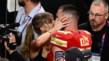 The Chiefs tight end and the global pop super star shared a passionate moment after Kansas City won the Super Bowl.