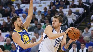 March 23, 2019; Oakland, CA, USA; Dallas Mavericks forward Luka Doncic (77) passes the basketball against Golden State Warriors guard Klay Thompson (11) during the first quarter at Oracle Arena. Mandatory Credit: Kyle Terada-USA TODAY Sports