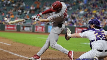 HOUSTON, TEXAS - MARCH 04: Brett Squires #12 of the Oklahoma Sooners doubles in the ninth inning against the LSU Tigers during the Shriners Children&#039;s College Classic at Minute Maid Park on March 04, 2022 in Houston, Texas.   Bob Levey/Getty Images/A