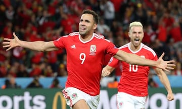 Robson-Kanu (left) celebrates putting Wales in front in Lille.