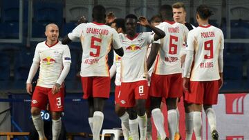 ISTANBUL, TURKEY - DECEMBER 02: Dani Olmo of RB Leipzig celebrates with team mates Amadou Haidara (C), Angelino (L), Dayot Upamecano (2L), Ibrahima Konate, Yussuf Poulsen of RB Leipzig after scoring their sides third goal during the UEFA Champions League 