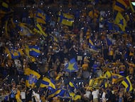 Fans of Tigres cheer for their team during the Liga MX Apertura tournament football match between Tigres and Tijuana at the UANL University Stadium in San Nicolas de los Garza, Nuevo Leon State, Mexico on October 25, 2025. (Photo by Julio Cesar AGUILAR / AFP)