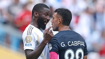 CHARLOTTE, NORTH CAROLINA - JUNE 22: Gustavo Cabral #22 of CF Pachuca reacts with Antonio Ruediger #22 of Real Madrid C. F. during the FIFA Club World Cup 2025 group H match between Real Madrid CF and CF Pachuca at Bank of America Stadium on June 22, 2025 in Charlotte, North Carolina. Richard Pelham/Getty Images/AFP (Photo by Richard Pelham / GETTY IMAGES NORTH AMERICA / Getty Images via AFP)
