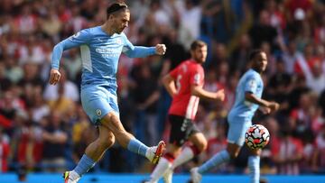 MANCHESTER, ENGLAND - SEPTEMBER 18: Jack Grealish of Manchester City passes the ball during the Premier League match between Manchester City and Southampton at Etihad Stadium on September 18, 2021 in Manchester, England. (Photo by Laurence Griffiths/Getty