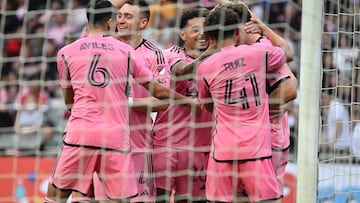 Inter Miami players celebrate a goal during the friendly football match between Hong Kong XI and US Inter Miami CF in Hong Kong on February 4, 2024. Inter Miami were booed off the pitch after their injured superstar Lionel Messi failed to take the field in a pre-season friendly in Hong Kong. (Photo by Peter PARKS / AFP)