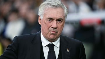 Real Madrid's Italian coach Carlo Ancelotti looks on before the Spanish league football match between Real Madrid CF and Valencia CF at the Santiago Bernabeu stadium in Madrid on April 5, 2025. (Photo by JAVIER SORIANO / AFP)
