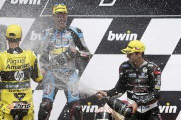 Johann Zarco, Tito Rabat y Alex Rins en el podio.