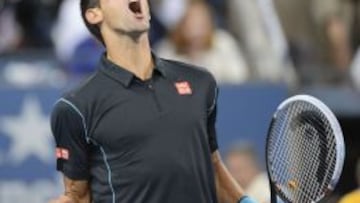 Novak Djokovic celebra su victoria ante el ruso Mikhail Youzhny.