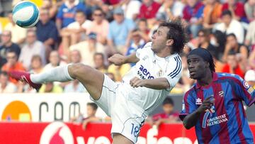 Real Madrid's Antonio Cassano (L) of Italy is challenged by Levante's Felix Ettien of Ivory Coast during their Spanish first league soccer match at the Ciudad de Valencia Stadium in Valencia, September 10, 2006. REUTERS/Heino Kalis (SPAIN)