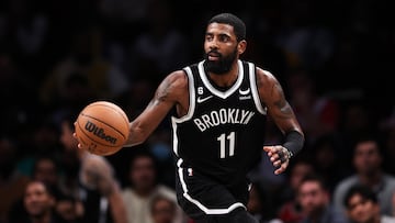 NEW YORK, NEW YORK - NOVEMBER 01: Kyrie Irving #11 of the Brooklyn Nets brings the ball up the court during the fourth quarter of the game against the Chicago Bulls at Barclays Center on November 01, 2022 in New York City. NOTE TO USER: User expressly acknowledges and agrees that, by downloading and or using this photograph, User is consenting to the terms and conditions of the Getty Images License Agreement.   Dustin Satloff/Getty Images/AFP