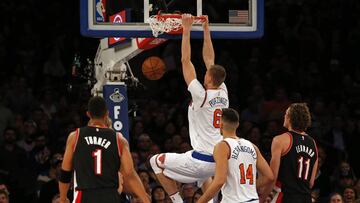 Nov 22, 2016; New York, NY, USA; New York Knicks forward Kristaps Porzingis (6) slam dunks the ball against the Portland Trail Blazers during the first half at Madison Square Garden. Mandatory Credit: Adam Hunger-USA TODAY Sports