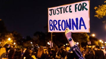 A protester carries a sign in honor of Breonna Taylor on September 23, 2020 in Chicago, Illinois. 