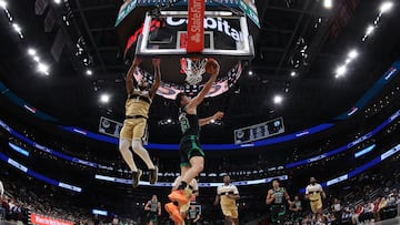 Boston Celtics guard Hugo Gonzalez (28) shoots the ball as Washington Wizards forward Cam Whitmore (1) defends in the second half at Capital One Arena.