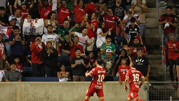 Aug 1, 2024; Bridgeview, Illinois, USA; Toluca midfielder Jesus Ricardo Angulo Uriarte (10)  reacts after scoring a goal against Chicago Fire FC during the first half at SeatGeek Stadium. Mandatory Credit: Mike Dinovo-USA TODAY Sports