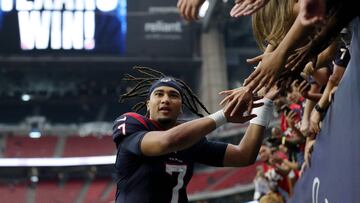 C.J. Stroud #7 of the Houston Texans high-fives fans