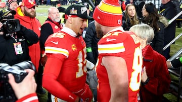 Jan 26, 2025; Kansas City, MO, USA; Kansas City Chiefs quarterback Patrick Mahomes (15) and tight end Travis Kelce (87) react after the AFC Championship gameagainst the Buffalo Bills at GEHA Field at Arrowhead Stadium. Mandatory Credit: Mark J. Rebilas-Imagn Images