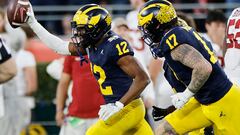 PASADENA, CALIFORNIA - JANUARY 01: Josh Wallace #12 of the Michigan Wolverines celebrates after recovering a fumble in the fourth quarter against the Alabama Crimson Tide during the CFP Semifinal Rose Bowl Game at Rose Bowl Stadium on January 01, 2024 in Pasadena, California.   Kevork Djansezian/Getty Images/AFP (Photo by KEVORK DJANSEZIAN / GETTY IMAGES NORTH AMERICA / Getty Images via AFP)