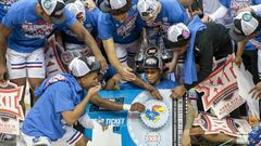 Mar 12, 2022; Kansas City, MO, USA; Kansas Jayhawks place their logo on the March Madness tournament ticket after the game against the Texas Tech Red Raiders at T-Mobile Center. Mandatory Credit: William Purnell-USA TODAY Sports