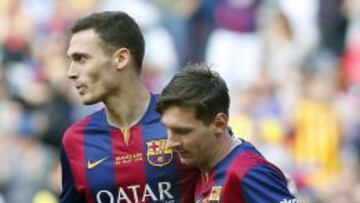 Vermaelen, con Leo Messi.