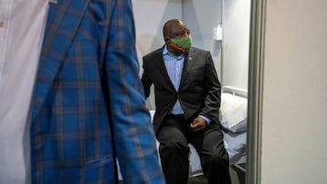 FILE PHOTO: South African President Cyril Ramaphosa visits the coronavirus disease (COVID-19) treatment facilities at the NASREC Expo Centre in Johannesburg, South Africa April 24, 2020. Jerome Delay/Pool via REUTERS/File Photo