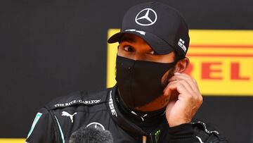 SPIELBERG, AUSTRIA - JULY 11: Pole position qualifier Lewis Hamilton of Great Britain and Mercedes GP is interviewed after qualifying for the Formula One Grand Prix of Styria at Red Bull Ring on July 11, 2020 in Spielberg, Austria. (Photo by Joe Klamar/Pool via Getty Images)