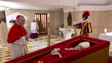 SENSITIVE MATERIAL. THIS IMAGE MAY OFFEND OR DISTURB Cardinal Pietro Parolin, the Vatican's secretary of state, stands near the body of Pope Francis, placed in an open casket during the rite of the declaration of death in Santa Marta residence at the Vatican, April 21, 2025. Vatican Media/Handout via REUTERS ATTENTION EDITORS - THIS IMAGE WAS PROVIDED BY A THIRD PARTY. TPX IMAGES OF THE DAY