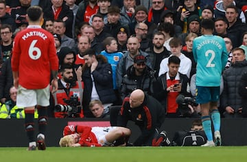 Garnacho receives medical attention after suffering an injury in the game against Southampton.