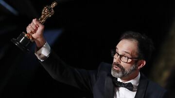 Andrew Buckland accepts the Oscar for Best Film Editing for "Ford v Ferrari" at the 92nd Academy Awards in Hollywood, Los Angeles, California, U.S., February 9, 2020. REUTERS/Mario Anzuoni