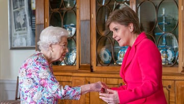 Britain's Queen Elizabeth II (L) greets Scotland's First Minister and leader of the Scottish National Party (SNP), Nicola Sturgeon, during an audience at the Palace of Holyroodhouse in Edinburgh, Scotland, on June 29, 2022. (Photo by Jane Barlow / POOL / AFP) (Photo by JANE BARLOW/POOL/AFP via Getty Images)