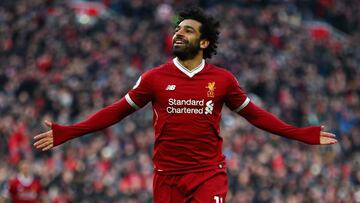 LIVERPOOL, ENGLAND - FEBRUARY 24: Mohamed Salah of Liverpool celebrates scoring his side's second goal during the Premier League match between Liverpool and West Ham United at Anfield on February 24, 2018 in Liverpool, England. (Photo by Clive Bru