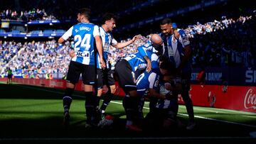 BARCELONA, SPAIN - NOVEMBER 06: Adria Pedrosa (obscured) of RCD Espanyol is congratulated by teammates after scoring his team&#039;s first goal during the La Liga Santander match between RCD Espanyol and Granada CF at RCDE Stadium on November 06, 2021 in 