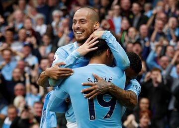 City's Silva-tion | Manchester City's Leroy Sane celebrates scoring their first goal with Danilo and the slicker David Silva.