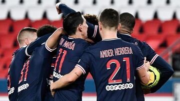 Paris&#039; players celebrate after scoring a goal during the French L1 football match between Paris-Saint Germain (PSG) and RC Strasbourg (RCSA) at The Parc des Princes Stadium in Paris, on December 23, 2020. (Photo by STEPHANE DE SAKUTIN / AFP)