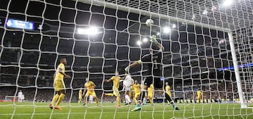 Varane hits the post.