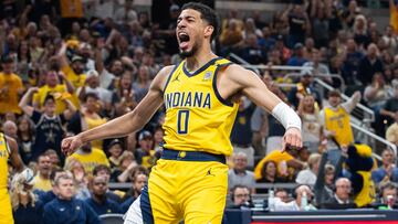 May 12, 2024; Indianapolis, Indiana, USA; Indiana Pacers guard Tyrese Haliburton (0) celebrates a made basket during game four of the second round for the 2024 NBA playoffs against the New York Knicks at Gainbridge Fieldhouse. Mandatory Credit: Trevor Ruszkowski-USA TODAY Sports