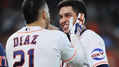 HOUSTON, TEXAS - SEPTEMBER 20: Mauricio Dubon #14 of the Houston Astros is congratulated by Yainer Diaz #21 after hitting a walk-off RBI single against the Baltimore Orioles at Minute Maid Park on September 20, 2023 in Houston, Texas.   Bob Levey/Getty Images/AFP (Photo by Bob Levey / GETTY IMAGES NORTH AMERICA / Getty Images via AFP)