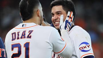 HOUSTON, TEXAS - SEPTEMBER 20: Mauricio Dubon #14 of the Houston Astros is congratulated by Yainer Diaz #21 after hitting a walk-off RBI single against the Baltimore Orioles at Minute Maid Park on September 20, 2023 in Houston, Texas.   Bob Levey/Getty Images/AFP (Photo by Bob Levey / GETTY IMAGES NORTH AMERICA / Getty Images via AFP)