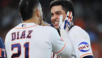 HOUSTON, TEXAS - SEPTEMBER 20: Mauricio Dubon #14 of the Houston Astros is congratulated by Yainer Diaz #21 after hitting a walk-off RBI single against the Baltimore Orioles at Minute Maid Park on September 20, 2023 in Houston, Texas. Bob Levey/Getty Images/AFP (Photo by Bob Levey / GETTY IMAGES NORTH AMERICA / Getty Images via AFP)