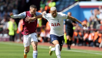 Tottenham Hotspur's Brazilian striker Richarlison (R) fights for the ball with Aston Villa's Argentinian midfielder Emiliano Buendia during the English Premier League football match between Aston Villa and Tottenham Hotspur at Villa Park in Birmingham, central England on May 13, 2023. (Photo by Adrian DENNIS / AFP) / RESTRICTED TO EDITORIAL USE. No use with unauthorized audio, video, data, fixture lists, club/league logos or 'live' services. Online in-match use limited to 120 images. An additional 40 images may be used in extra time. No video emulation. Social media in-match use limited to 120 images. An additional 40 images may be used in extra time. No use in betting publications, games or single club/league/player publications. /