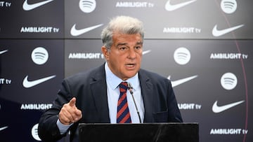 FC Barcelona's President Joan Laporta gestures during a press conference at the Ciudad Deportiva Joan Gamper in Sant Joan Despi, near Barcelona, on January 14, 2025. Dani Olmo's future at Barcelona remains in the balance as the Catalan club pursue their legal battle to get the midfielder registered to play once more. FC Barcelona's failure to meet La Liga's budgetary rules to license both Olmo and forward Pau Victor before the end of last year currently leaves them ineligible to play for the rest of the season. (Photo by Josep LAGO / AFP)