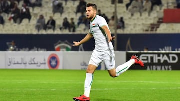 Iraq&#039;s defender Ali Faez celebrates after scoring a goal against Qatar during their 2017 Gulf Cup of Nations group match at Al Kuwait Sports Club Stadium in Kuwait City on December 26, 2017. / AFP PHOTO / GIUSEPPE CACACE