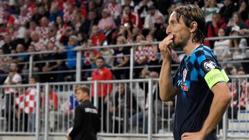 Croatia's midielder #10 Luka Modric (R) looks on during the UEFA Euro 2024 Group D qualification football match between Croatia and Turkey at the OPUS Arena Stadium in Osijek, on October 12, 2023. (Photo by Denis LOVROVIC / AFP)