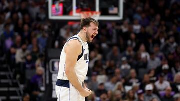 Luka Doncic #77 of the Dallas Mavericks reacts after the Mavericks scored a basket Sacramento Kings in the second half at Golden 1 Center on March 26, 2024 in Sacramento, California.