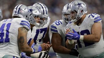 ARLINGTON, TX - NOVEMBER 20: Dak Prescott #4 of the Dallas Cowboys calls a play in the huddle during the second half against the Baltimore Ravens at AT&amp;T Stadium on November 20, 2016 in Arlington, Texas.   Ronald Martinez/Getty Images/AFP
 == FOR NEWSPAPERS, INTERNET, TELCOS &amp; TELEVISION USE ONLY ==
