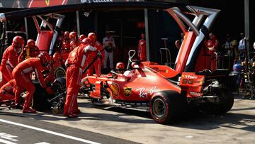 MELBOURNE, AUSTRALIA - MARCH 17: Sebastian Vettel of Germany driving the (5) Scuderia Ferrari SF90 makes a pit stop during the F1 Grand Prix of Australia at Melbourne Grand Prix Circuit on March 17, 2019 in Melbourne, Australia. (Photo by Robert Cianfl